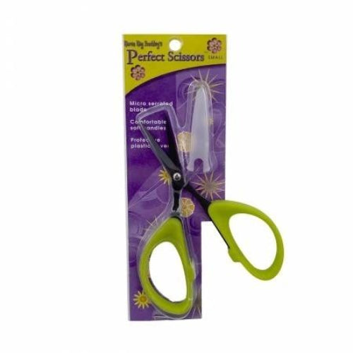 Pair of green-handled Perfect Scissors by Karen Kay Buckley in a purple packaging with 'Perfect Scissors' branding.